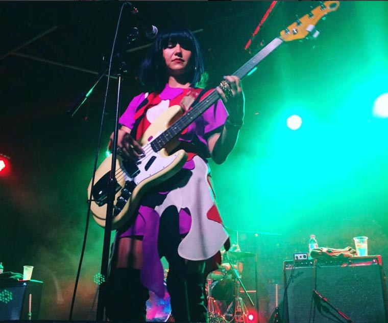 Laura-Lee-of-Khruangbin-performing-in-London-wearing-LONGSHAW-WARD